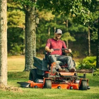 Pillowle Bad Boy ZT Elite 60-inch gas zero-turn mower with a 26 HP engine, featuring large cutting deck and rugged design.