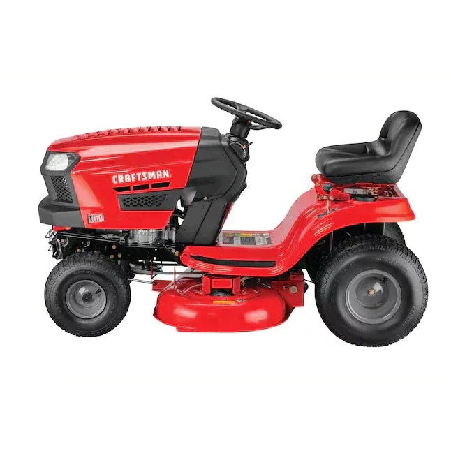 Craftsman T110 riding lawn mower with 42-inch cutting deck, shown on a grassy lawn. Black and gray mower with control panel and seat.