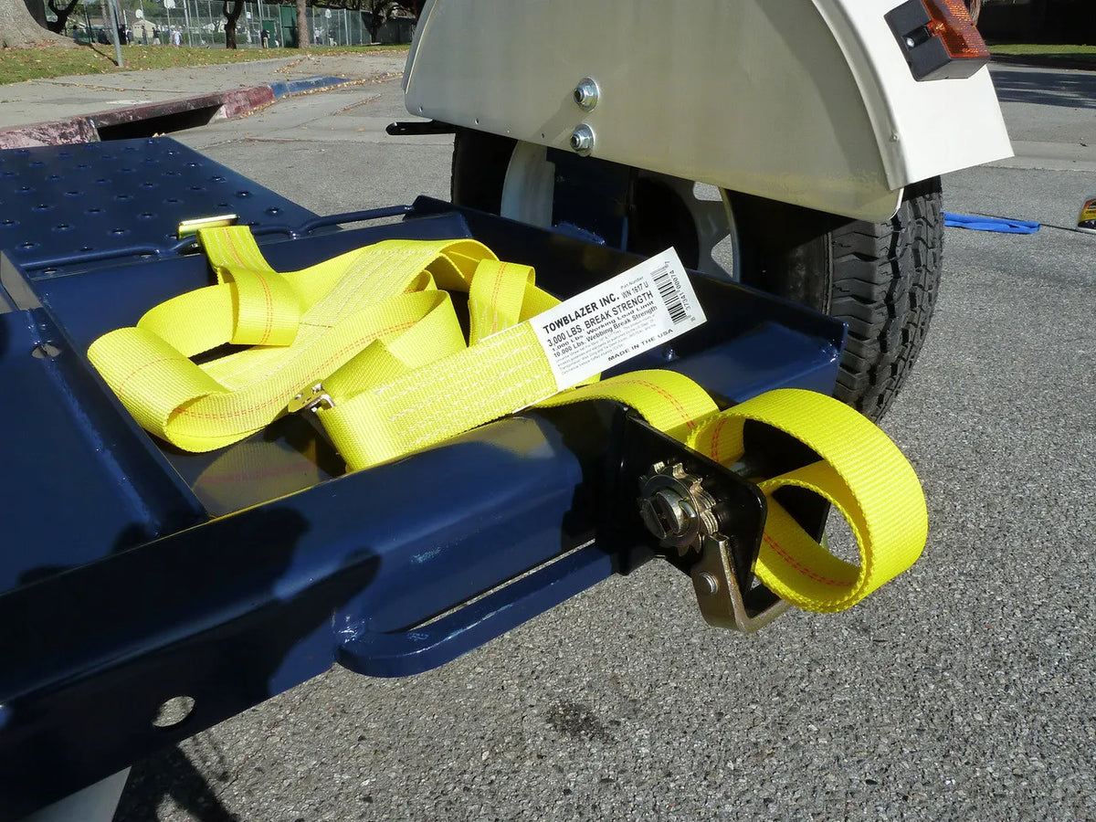 Heavy-duty Pillowle Tow Max vehicle tow dolly with 4,900 lb capacity, featuring sturdy construction and wheel straps for towing.