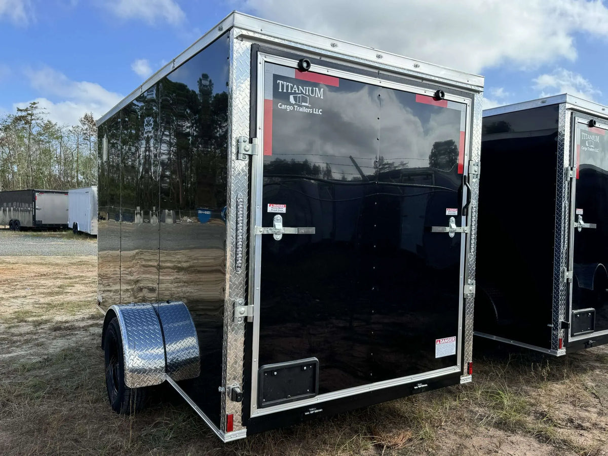Black Titanium Cargo 6x12 single axle enclosed trailer by Pillowle, showing the sleek exterior and durable construction.